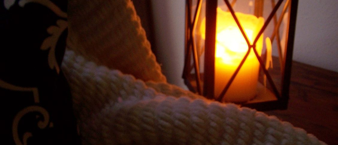 lantern, candle, blanket