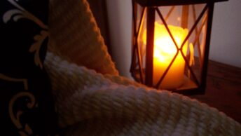 lantern, candle, blanket